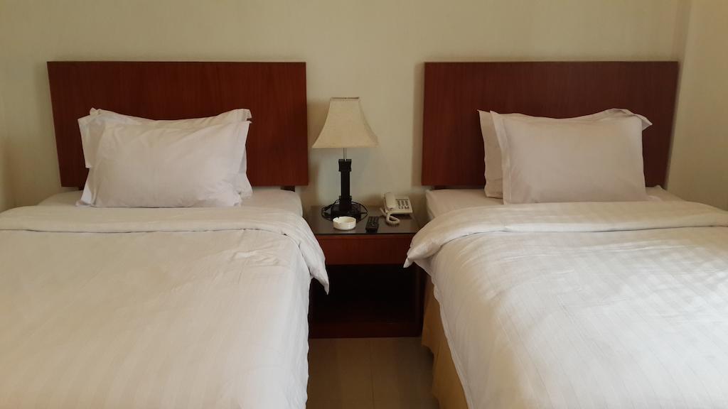 Kailani Inn Медан Стая снимка