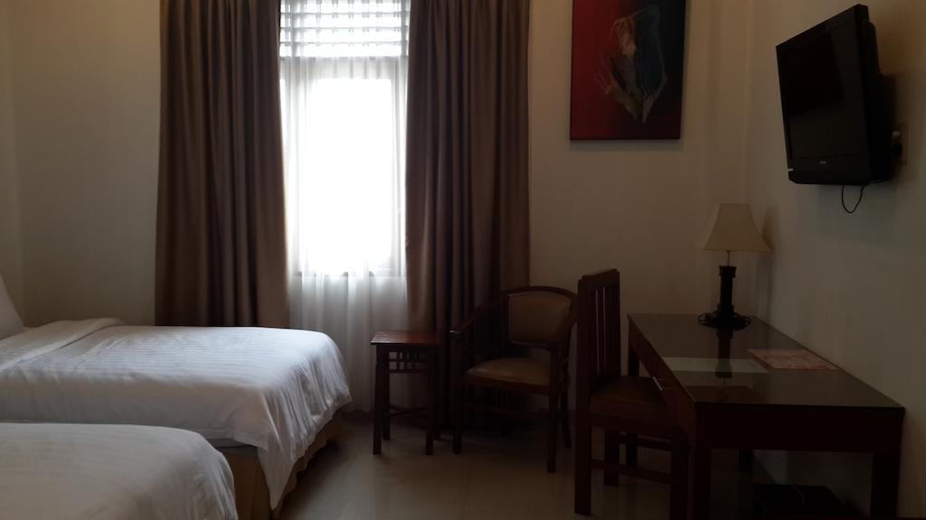 Kailani Inn Медан Стая снимка